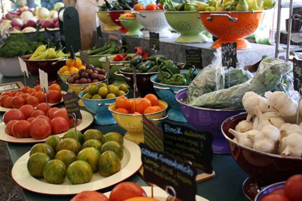 a table full of fruits and vegtables.